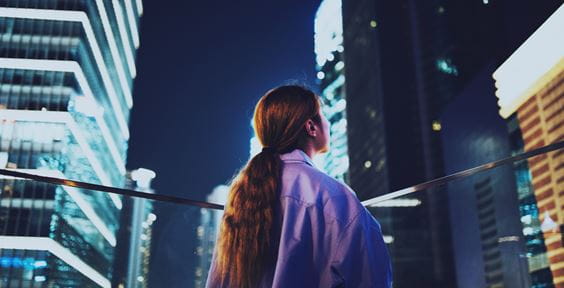 Woman is watching on buildings